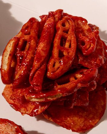 Un bite Flaming Hot en su caja